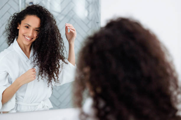 istock Bathroom Beauty: Woman in the Mirror 1726067049