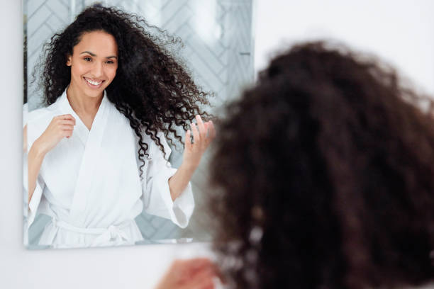 istock Bathroom Beauty: Woman in the Mirror 1726067625