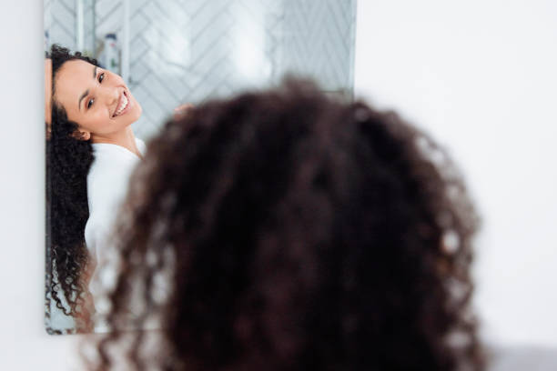 istock Bathroom Beauty: Woman in the Mirror 1726067628