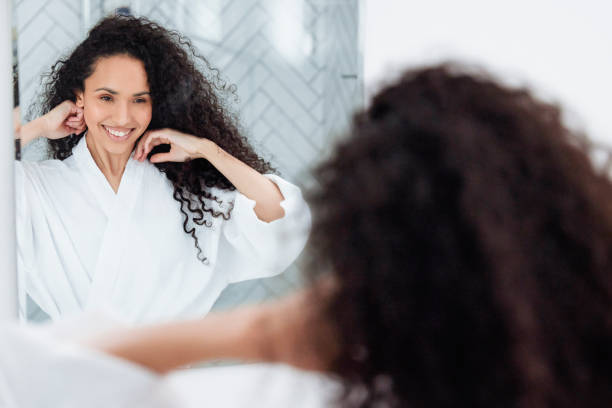 istock Bathroom Beauty: Woman in the Mirror 1726067640
