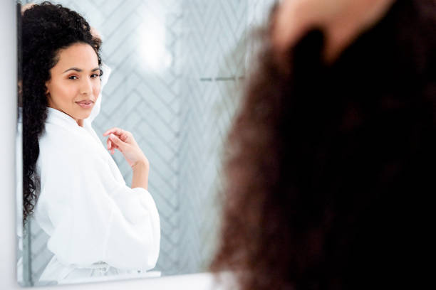 istock Bathroom Beauty: Woman in the Mirror 1726068046