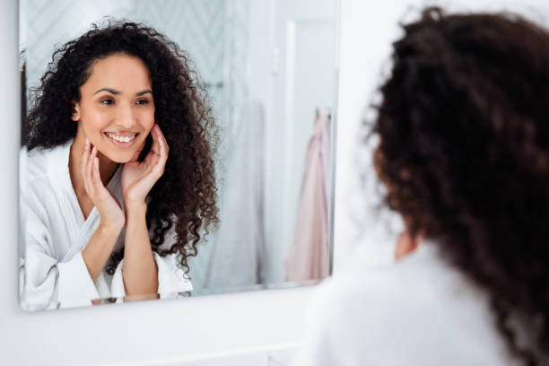 istock Bathroom Beauty: Woman in the Mirror 1726068239