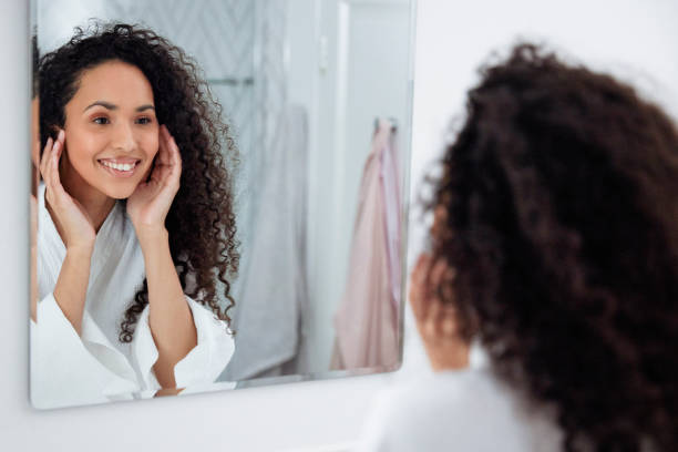 istock Bathroom Beauty: Woman in the Mirror 1726068447