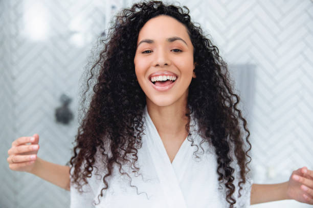 istock Bathroom Beauty: Woman in the Mirror 1726068870