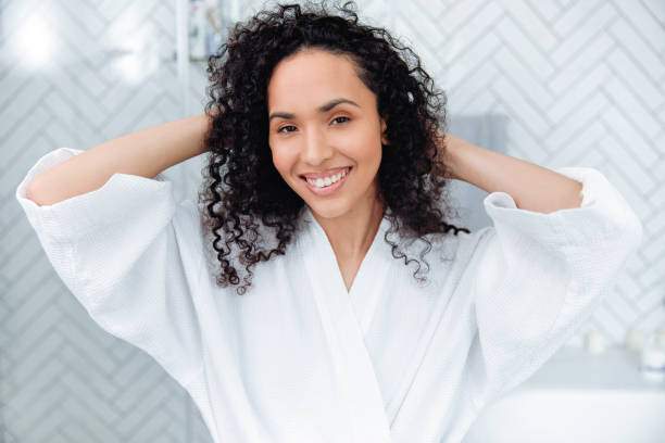 istock Bathroom Beauty: Woman in the Mirror 1726068876