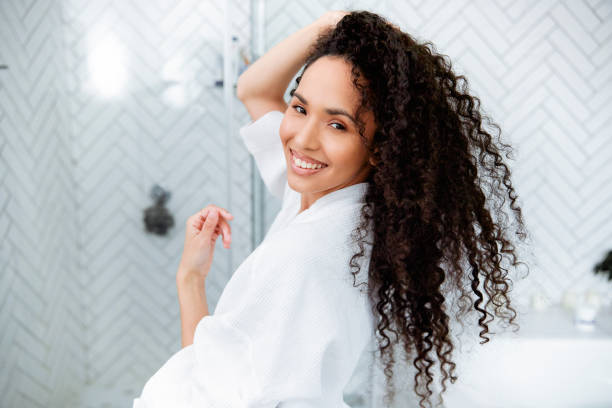 istock Bathroom Beauty: Woman in the Mirror 1726068946