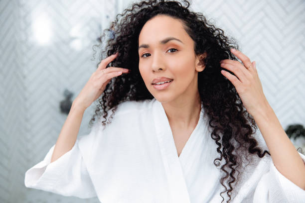 istock Bathroom Beauty: Woman in the Mirror 1726069465