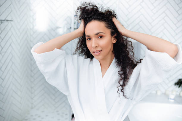 istock Bathroom Beauty: Woman in the Mirror 1726069523