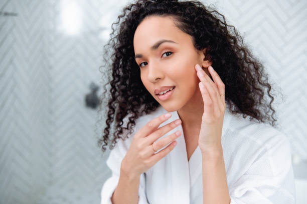 istock Bathroom Beauty: Woman in the Mirror 1726070599
