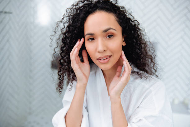 istock Bathroom Beauty: Woman in the Mirror 1726070757