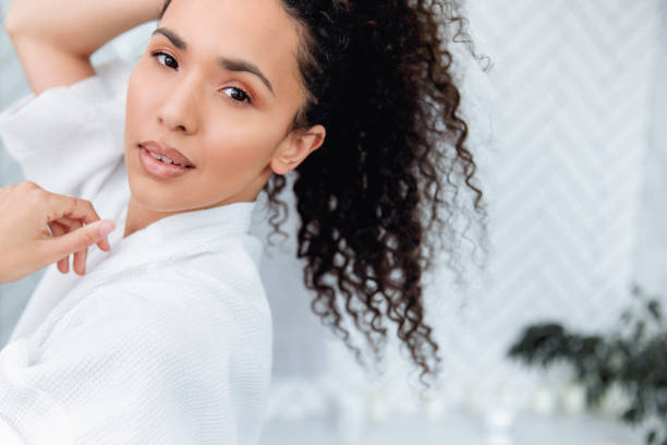 istock Bathroom Beauty: Woman in the Mirror 1726070837