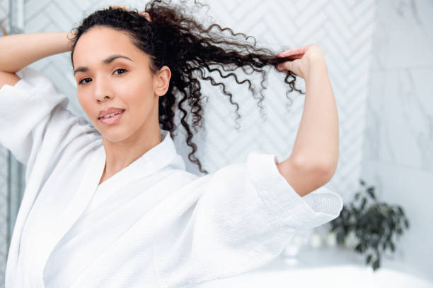 istock Bathroom Beauty: Woman in the Mirror 1726071432