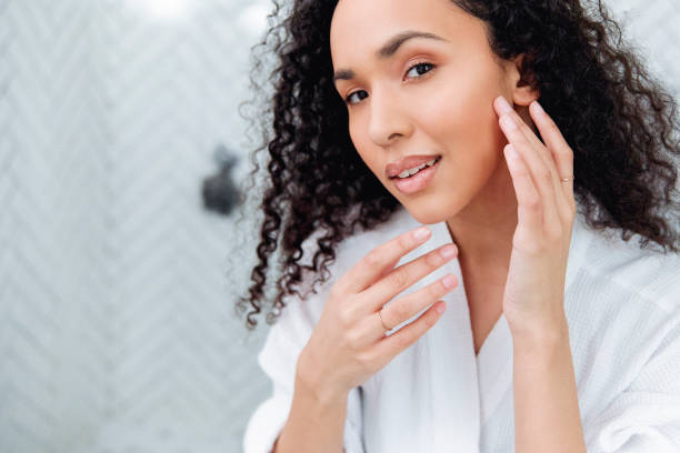 istock Bathroom Beauty: Woman in the Mirror 1726072020