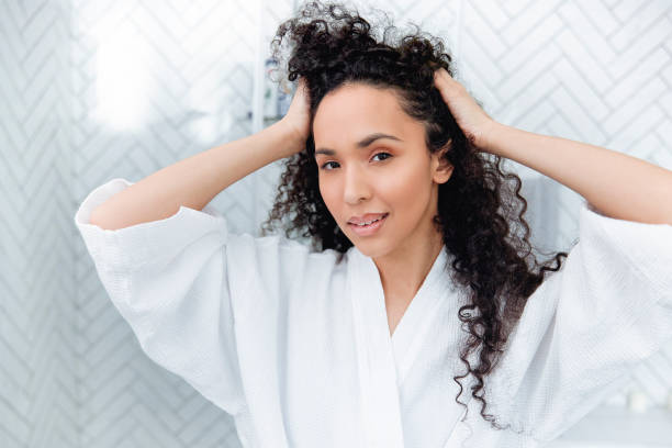 istock Bathroom Beauty: Woman in the Mirror 1726073465