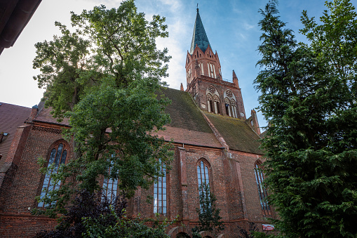 Trzebiatow, Poland - September 18, 2023: Medieval Mariacki church in historical city center market square.