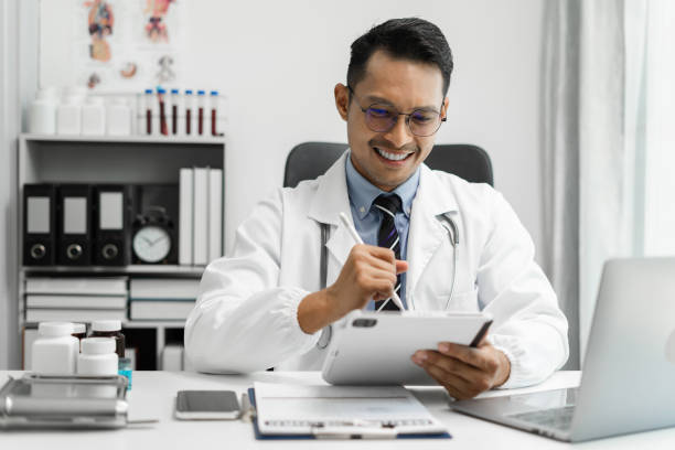 istock Doctor work on digital tablet healthcare doctor technology tablet using computer in a modern office  in the morning at the desk. 1726080829
