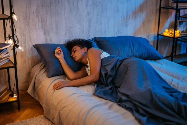 istock Young Woman Sleeping In The Bed At Night 1726085982