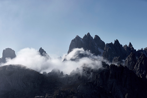 Mountain peaks in the clouds, Dolomites, Italy