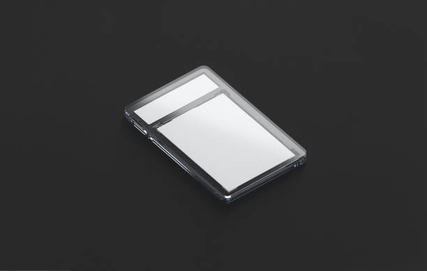 istock Blank transparent plastic trading card mockup, dark background 1726093215
