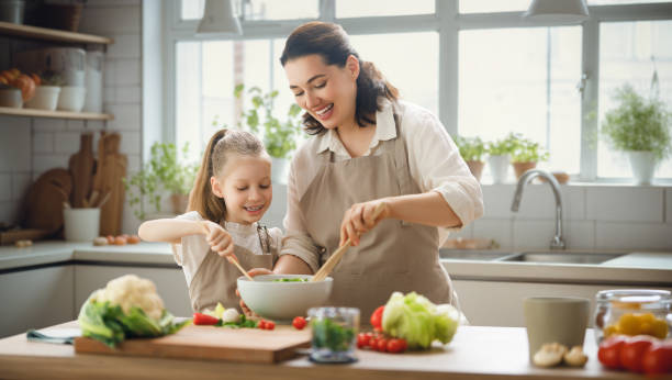 istock Happy family in the kitchen. 1726093270