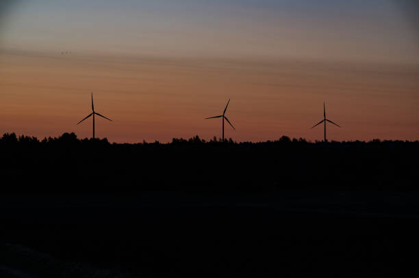 istock Wind turbin wings on morning sky in October 1726096239