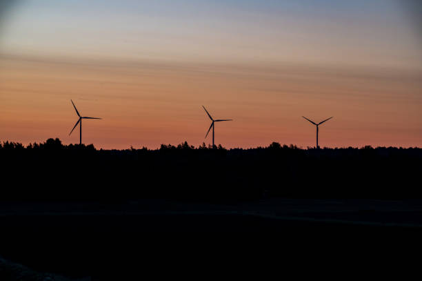 istock Wind turbin wings on morning sky in October 1726096348