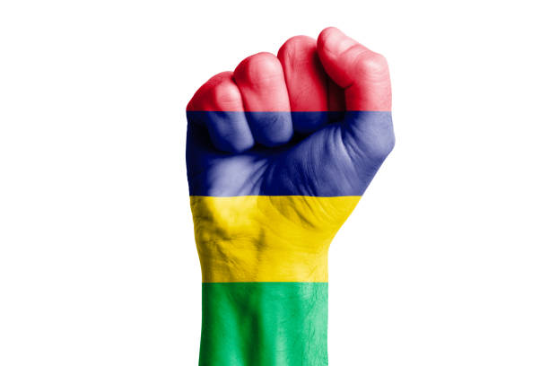 istock Man hand fist of MAURITIUS flag painted. Isolate 1726099484