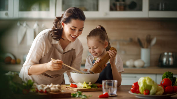 istock Happy family in the kitchen. 1726112304