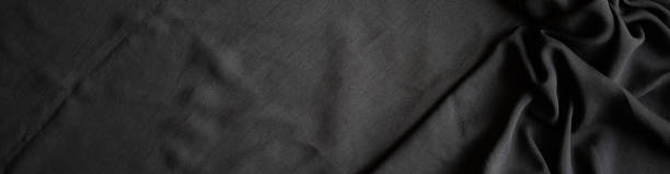 istock Abstract wavy gray fabric banner copy space 1726113796