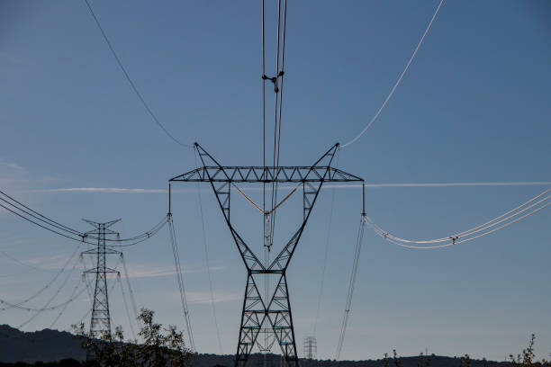 istock High voltage towers and electric cables in the pasture 1726158192