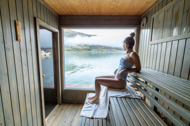 istock Young woman relaxing in floating sauna 1726180617
