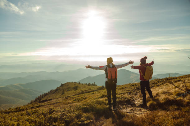 istock Female hikers enjoying the view from mountain peak 1726190713