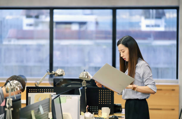 istock An Asian female office worker is working seriously in the office 1726193078