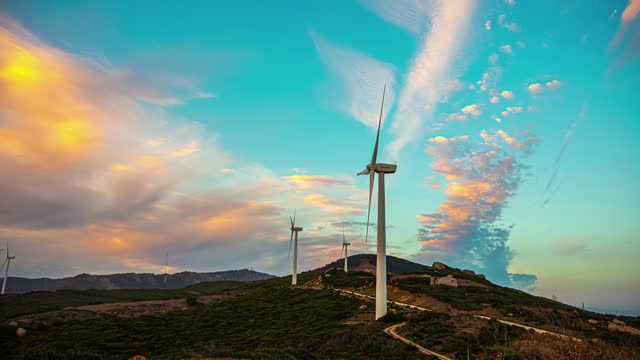 Wind turbines overlooking the Strait of Gibraltar - sunset time lapse