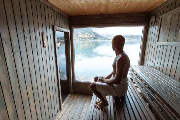 istock Young man relaxing in a floating sauna enjoying the wellbeing 1726195798
