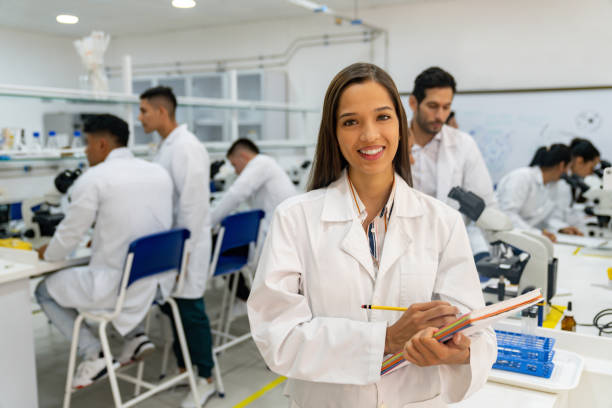istock Happy science student smiling at the lab 1726207660