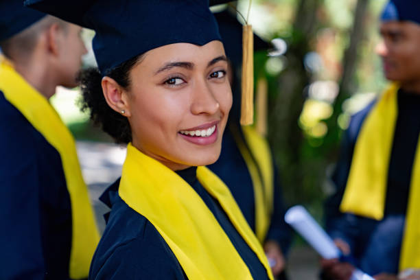istock Happy female student smiling on her graduation day 1726208800
