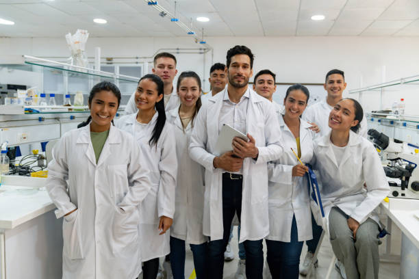 istock Science teacher with a group of students in the laboratory 1726209366