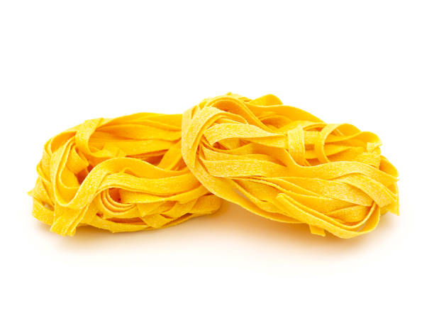 istock Fettuccine pasta nest isolated on white background 1726218174