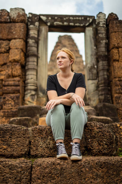 istock Young Redhead Girl Exploring Angkor Wat, Cambodia 1726238496