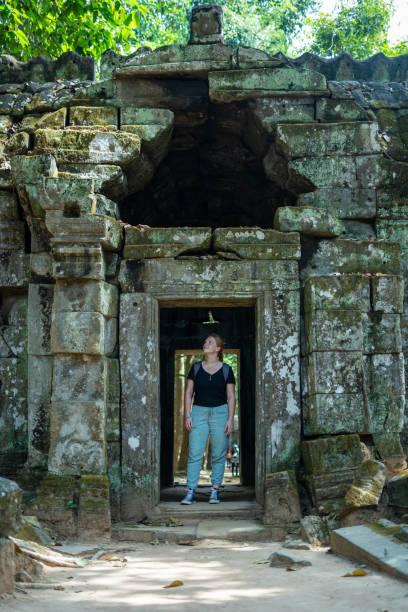 istock Young Redhead Girl Exploring Angkor Wat, Cambodia 1726240901