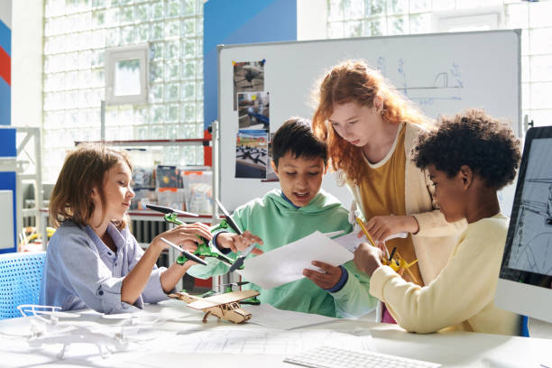 istock Schoolchildren Reading Manual 1726243456