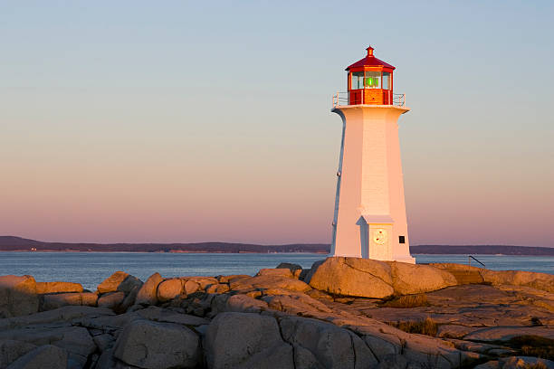 istock Golden light on Peggy's Cove lighthouse 172624386