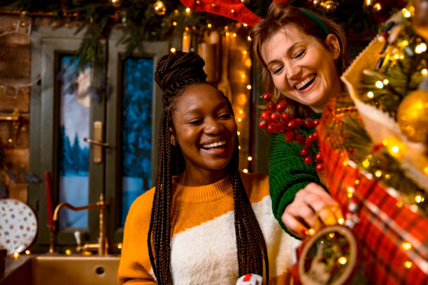 istock Women Decorating tree for Christmas 1726244524