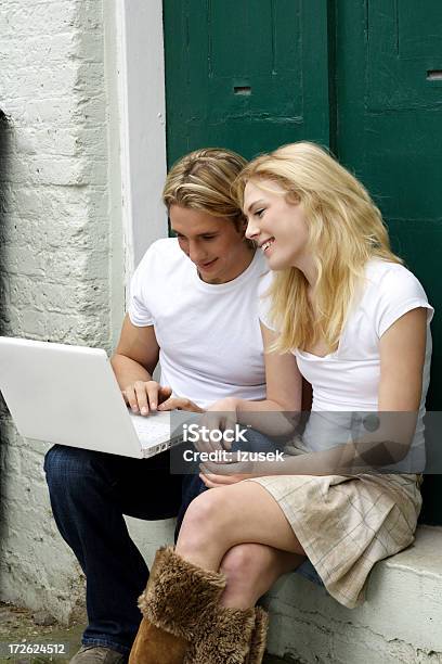 Couples With Computer Stock Photo - Download Image Now - Adult, Cheerful, City