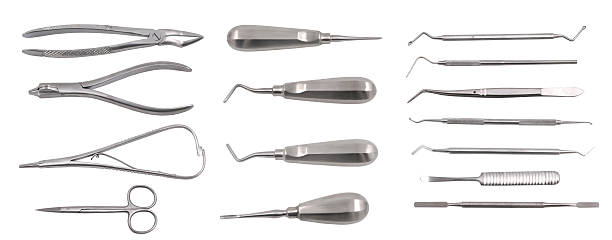 complete set of dental tools "Complet set of dental tools, isolated on white, very sharp, high resolution and qualityView the lightbox of my other dental images:" forceps stock pictures, royalty-free photos & images
