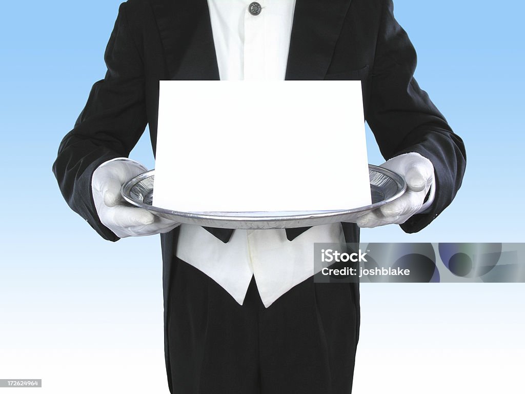 formal invitation bulter gives you blank invitation Invitation Stock Photo