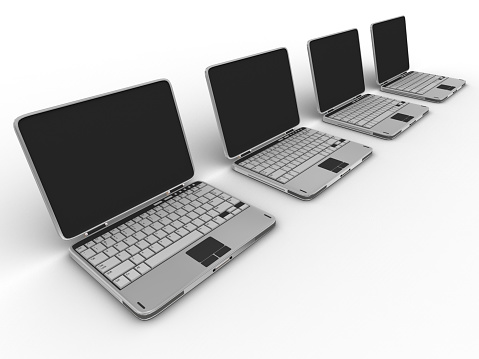 A row of Silver unbranded laptop computers with clipping pathOther Laptop Images