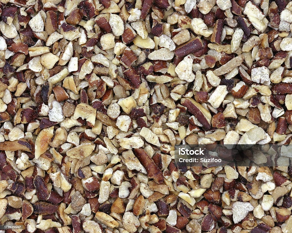 chopped pecans Chopped pecans background. Chopped Food Stock Photo