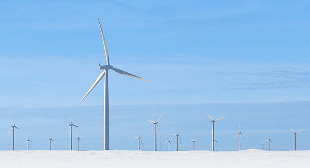 istock Windmills and wind turbines in winter snow 172626109
